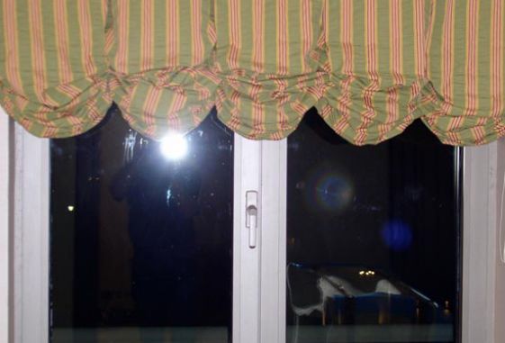 Custom-arched-shaped-pleated-window-treatments-drapery-balloon-shade